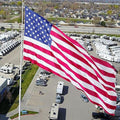American Flag - Heavy-Duty US Flag - Embroidered Stars - Nylon USA Flag Built for Outdoors - Sewn Stripes - UV Protection - Brass Grommets (12x18 ft)