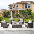 Wicker Patio Furniture Set：7 Piece Outdoor Patio Furniture Set with 2 Swivel Patio Chairs 2 Single Chairs a Coffee Table and 2 Ottomans, Brown Wicker/Beige Cushion